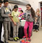 Les ateliers robotique à l'Exploradôme, les enfants en pleine action